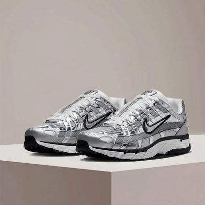 Nike P-6000 CNPT Performance løbesko til både mænd og kvinder – Avanceret støddæmpning og stabilitet CN0149-001