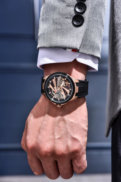 Ceas pentru bărbați PAGANI DESIGN – Model mecanic automat de lux, de tip „schelet” (cu mecanism expus), dotat cu un tourbillon, sticlă de safir cu tratament antireflex, rezistent la apă și luminescent.